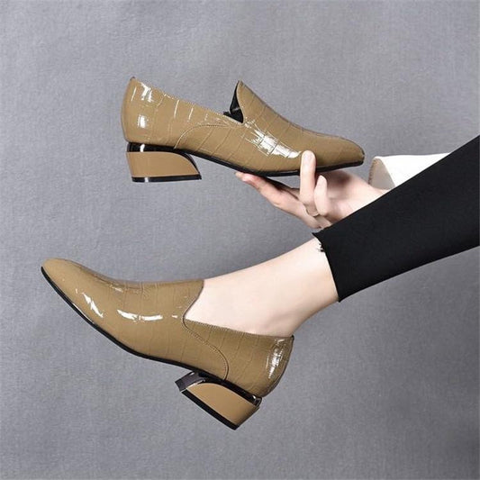 Hand-stitched patent leather side zip block heels